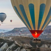 Discover the beauty of balloon city in Turkey, where hot air balloons soar over Cappadocia’s breathtaking valleys, fairy chimneys, and rock formations